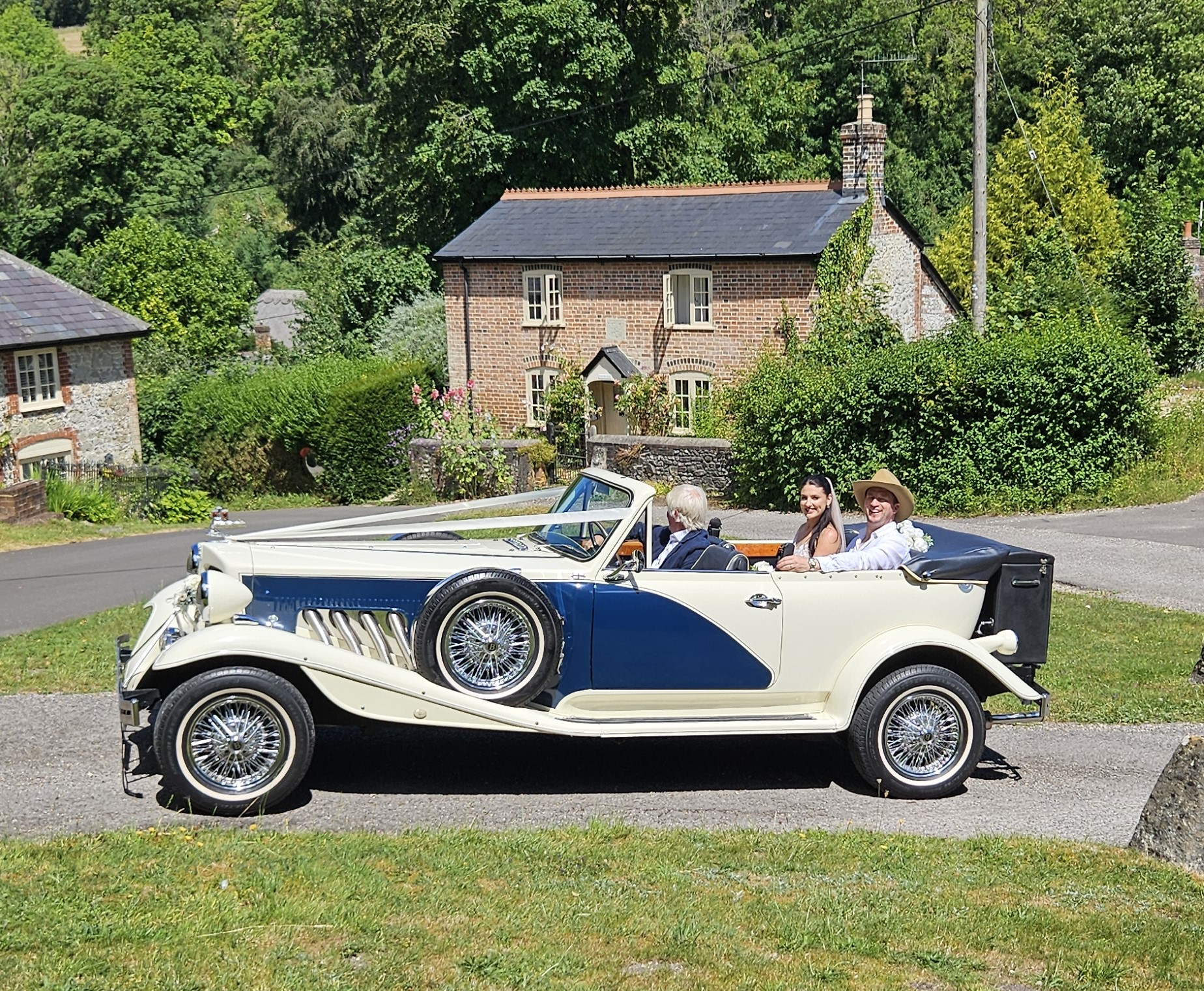 Bride and Groom in Beauford Tourer at Tollard Royal