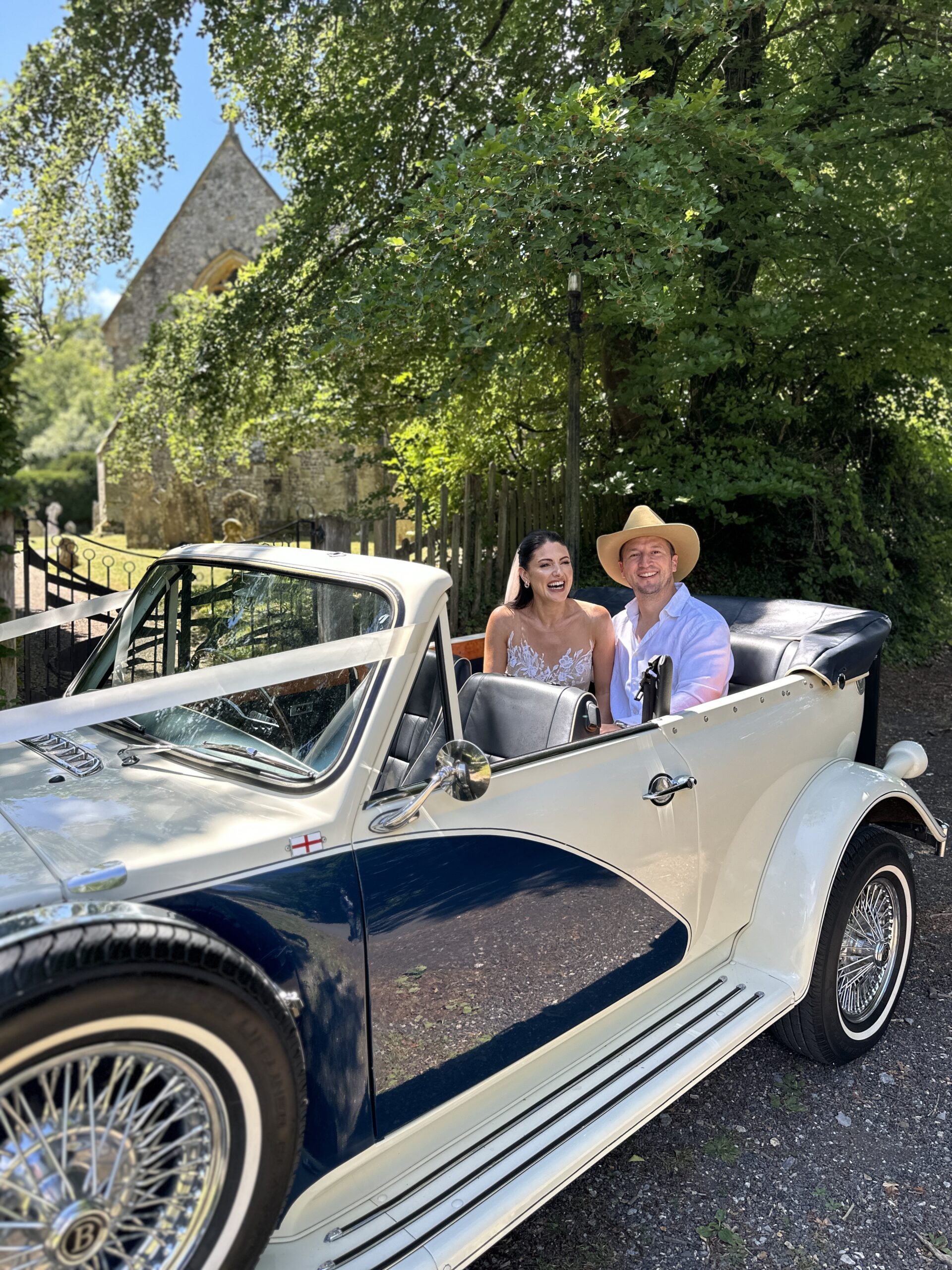 Bride and Groom in Cranborne Chase Beauford Tourer